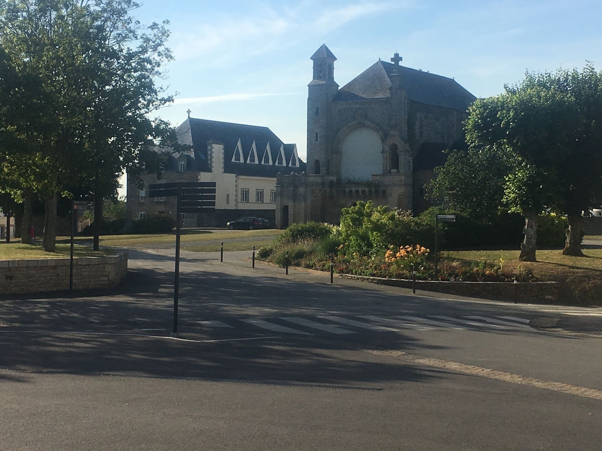 A church with a prominent tower and a large arched entrance.