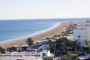 På stranden och strandhanddukar