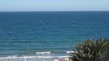 On the beach, beach towels