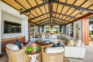 Multiple seating areas and flat-screen TV for cozy nights in.
