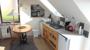 Réfrigérateur, four, lave-vaisselle, grille-pain