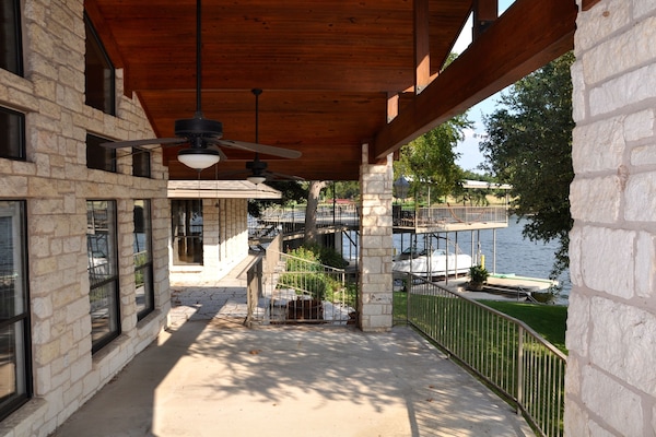 Porch deck outside master looking out to lake