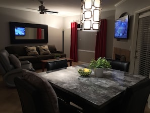 Smart TV, fireplace, books