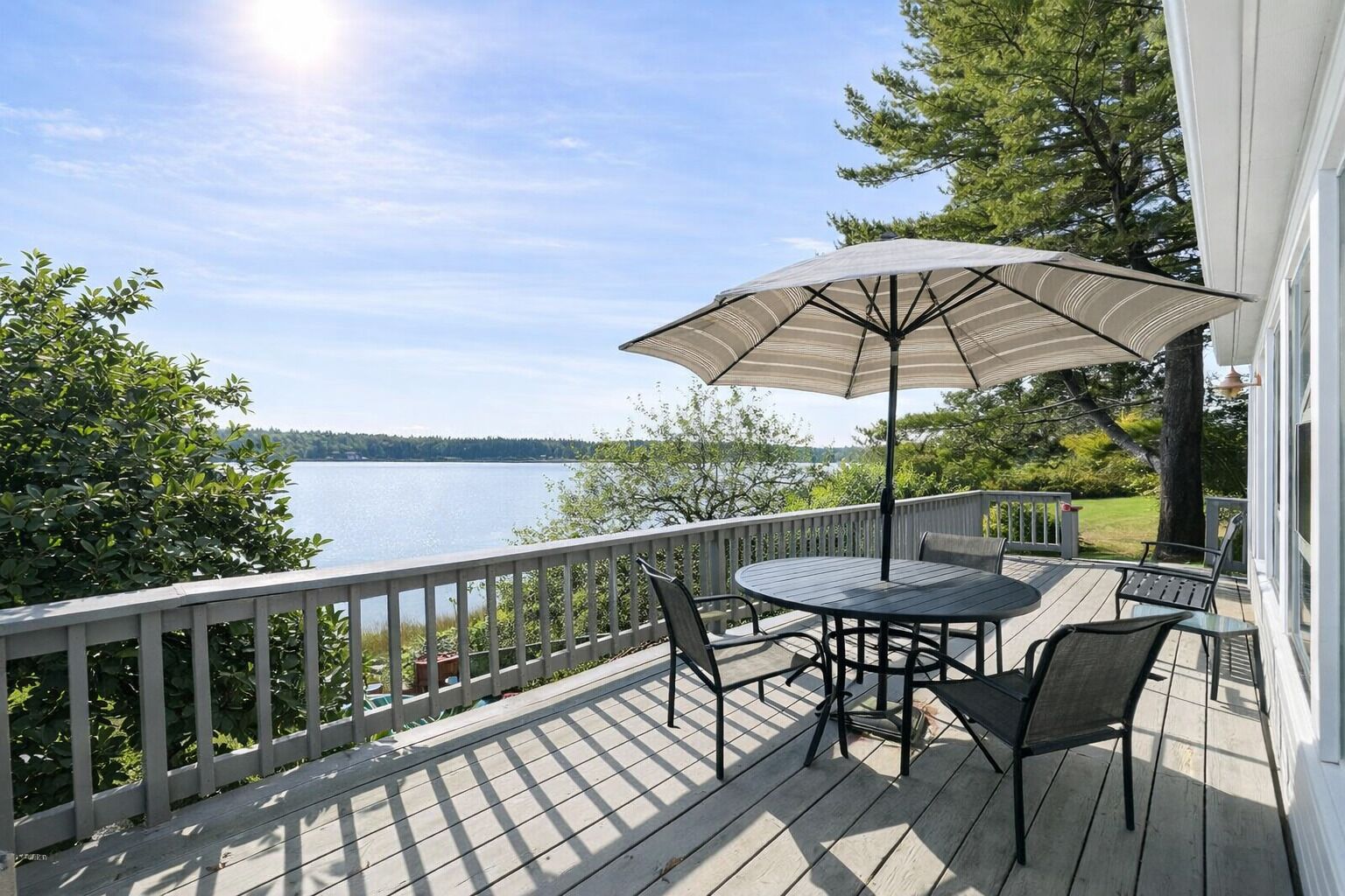 Have breakfast, lunch and dinner out on the large expansive deck overlooking Basin Cove.