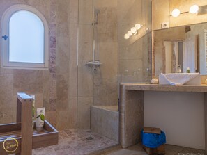 Shower, towels, toilet paper