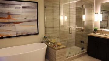 Bathtub, hair dryer, towels, soap