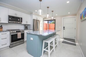 Fridge, microwave, dishwasher, coffee/tea maker