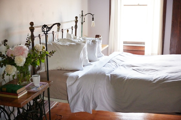 closeup of queen sized bed in the main bedroom