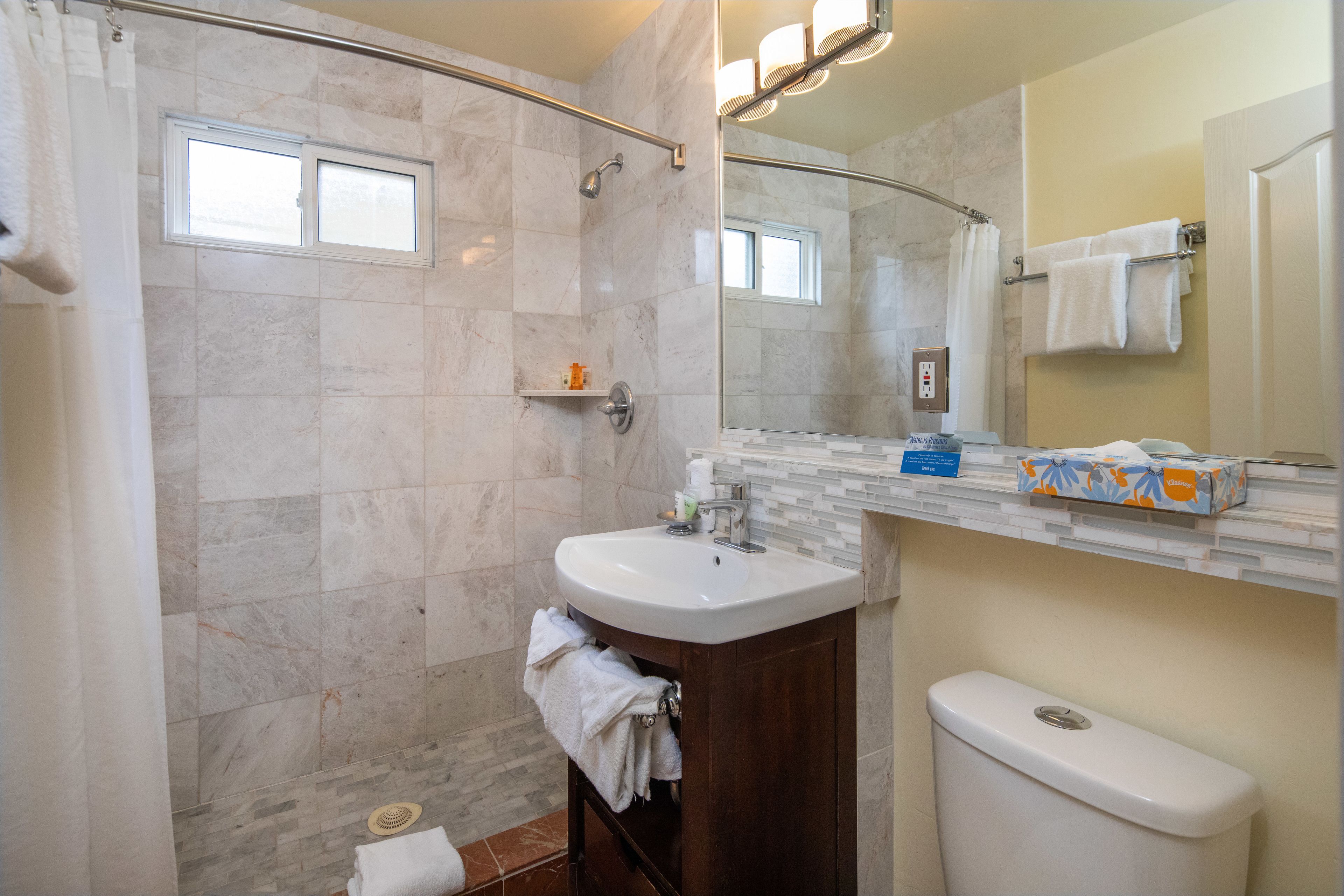 king balcony | bathroom | shower, free toiletries, hair dryer, towels