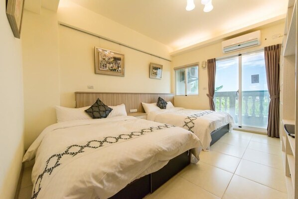 Quadruple Room, Non Smoking, Partial Ocean View | 4 bedrooms, premium bedding, down comforters, desk - Su Xinghai B&B (Ji'an)