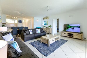 Standard Apartment, 2 Bedrooms, Sea View | Living area | Flat-screen TV, DVD player - Beach Front Lagoon Lodge Apartments (Whitsundays)