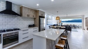 Apartment, 2 Bedrooms, Sea View | Private kitchen - Beachfront Frangipani Apartments (Whitsundays)