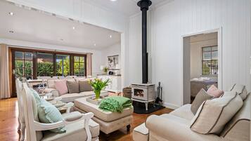 Family House, 3 Bedrooms, Garden View | Living area | Flat-screen TV, fireplace