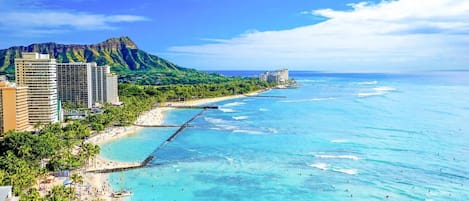 Beach nearby, white sand, sun loungers, beach umbrellas