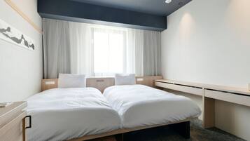 Desk, blackout curtains, iron/ironing board (on request), free WiFi