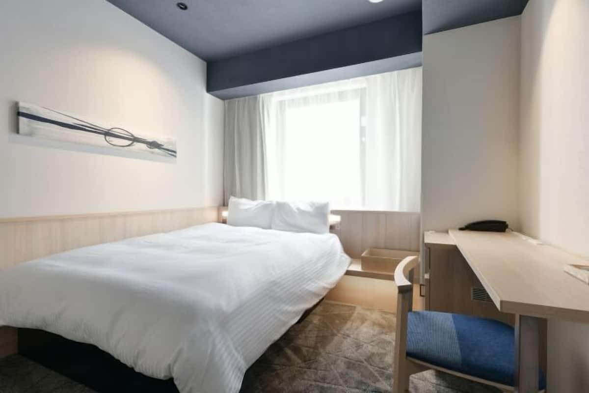 Desk, blackout curtains, iron/ironing board (on request), free WiFi