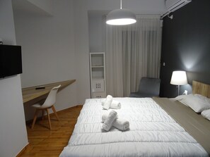 Appartement, 1 slaapkamer | 1 slaapkamer, een strijkplank/strijkijzer, gratis wifi, beddengoed