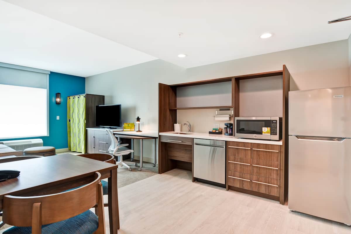 suite, 1 king bed, accessible (mobility & hearing, roll-in shower) | private kitchen | full-sized fridge, microwave, dishwasher, coffee/tea maker