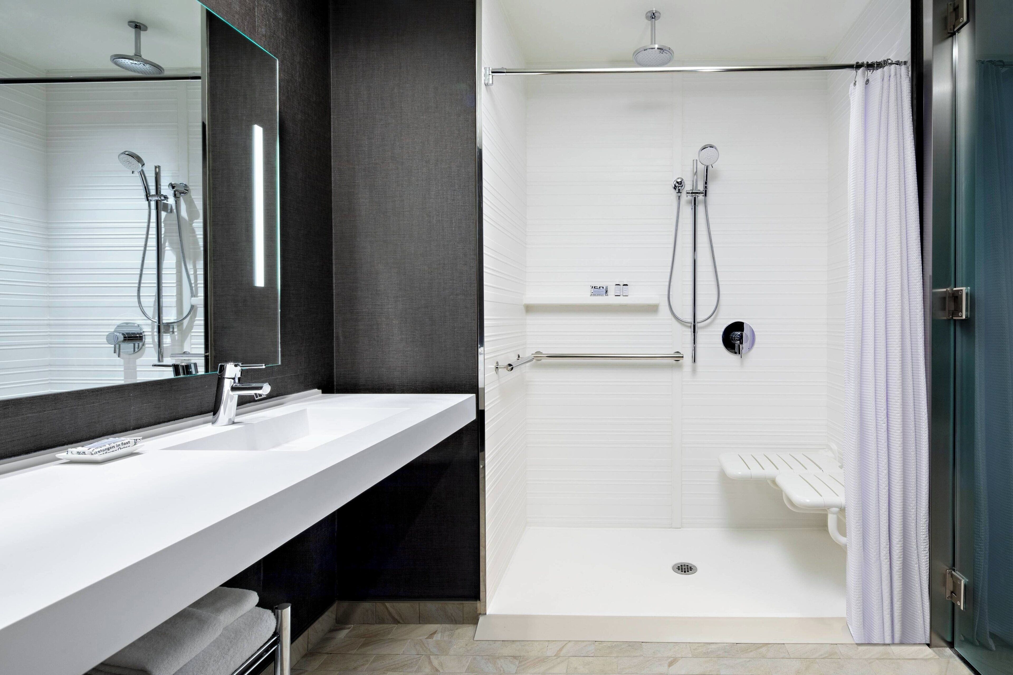 rainfall showerhead, free toiletries, hair dryer, towels