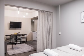 Appartement de base | Système d’insonorisation, fer et planche à repasser