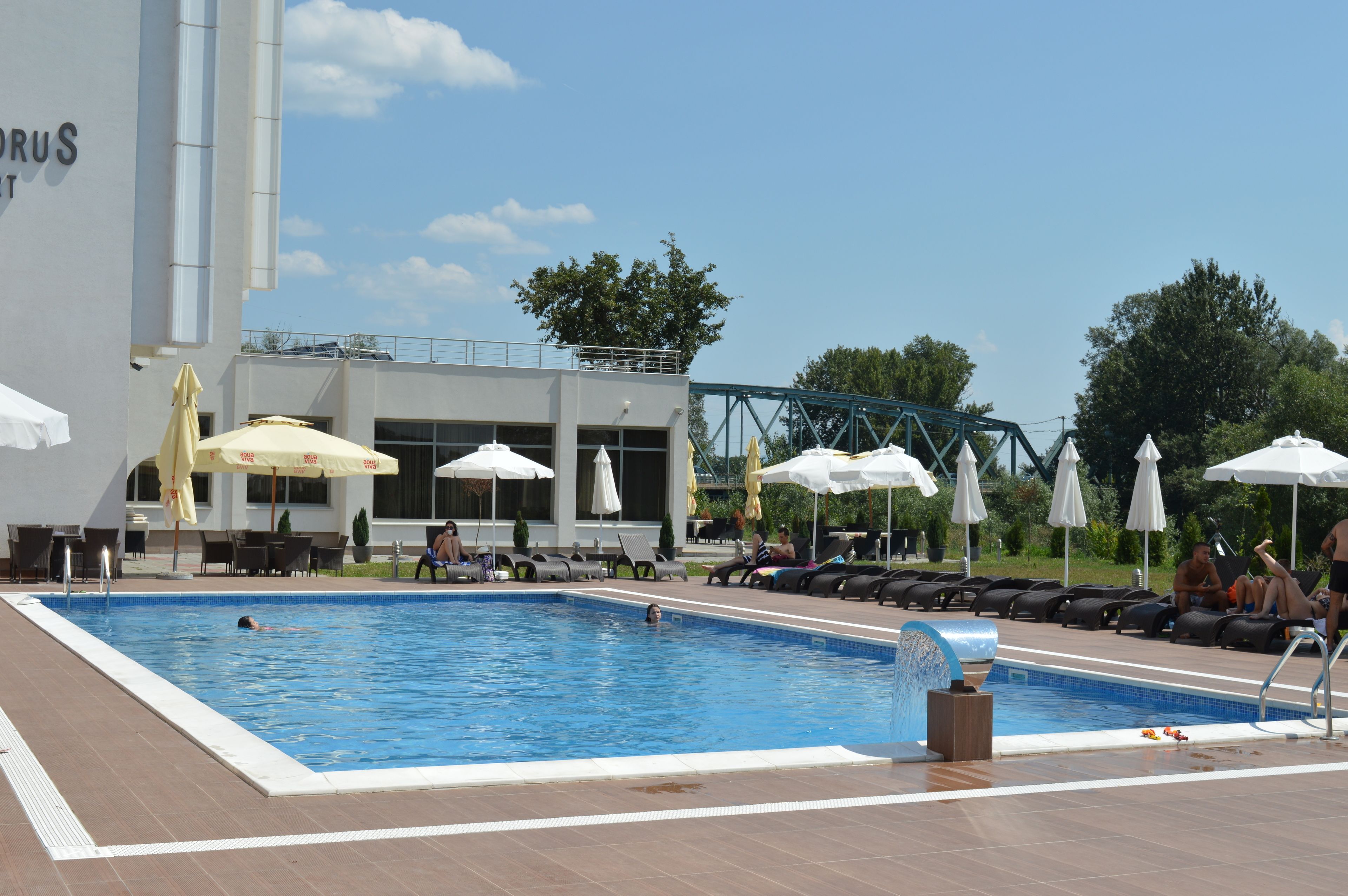Outdoor pool, pool umbrellas, pool loungers
