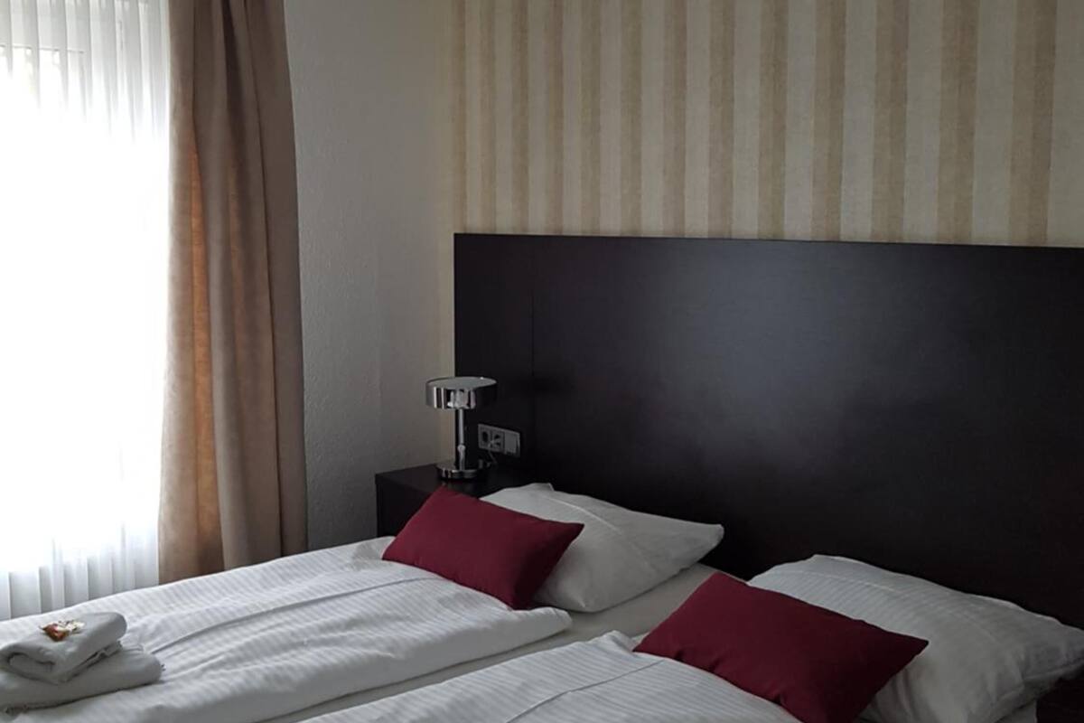 hypo-allergenic bedding, desk, rollaway beds, free wifi