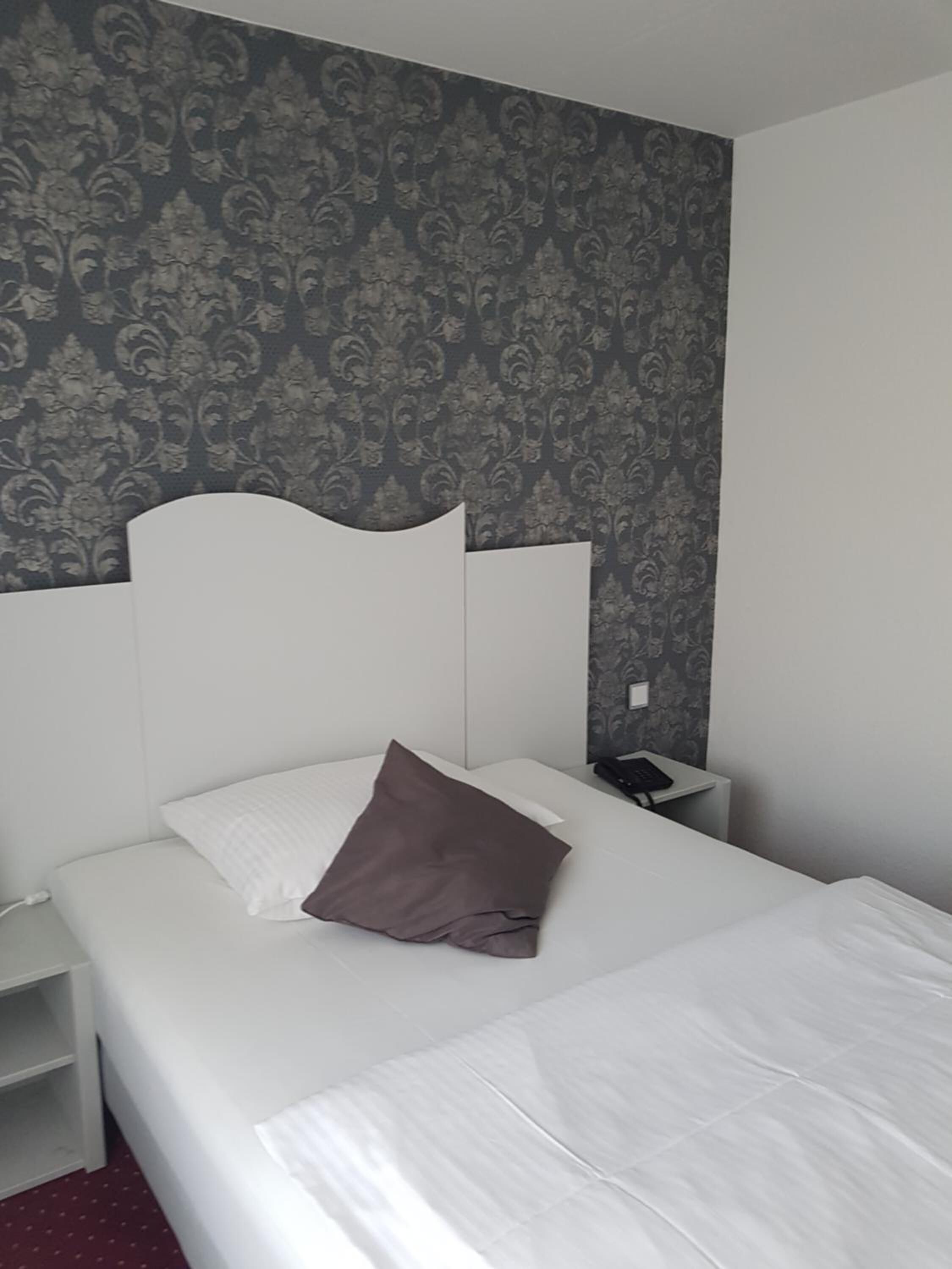 hypo-allergenic bedding, desk, rollaway beds, free wifi