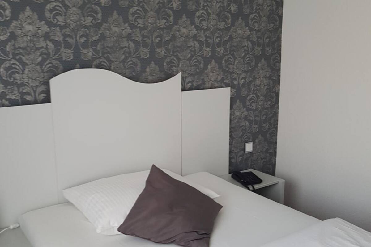 hypo-allergenic bedding, desk, rollaway beds, free wifi