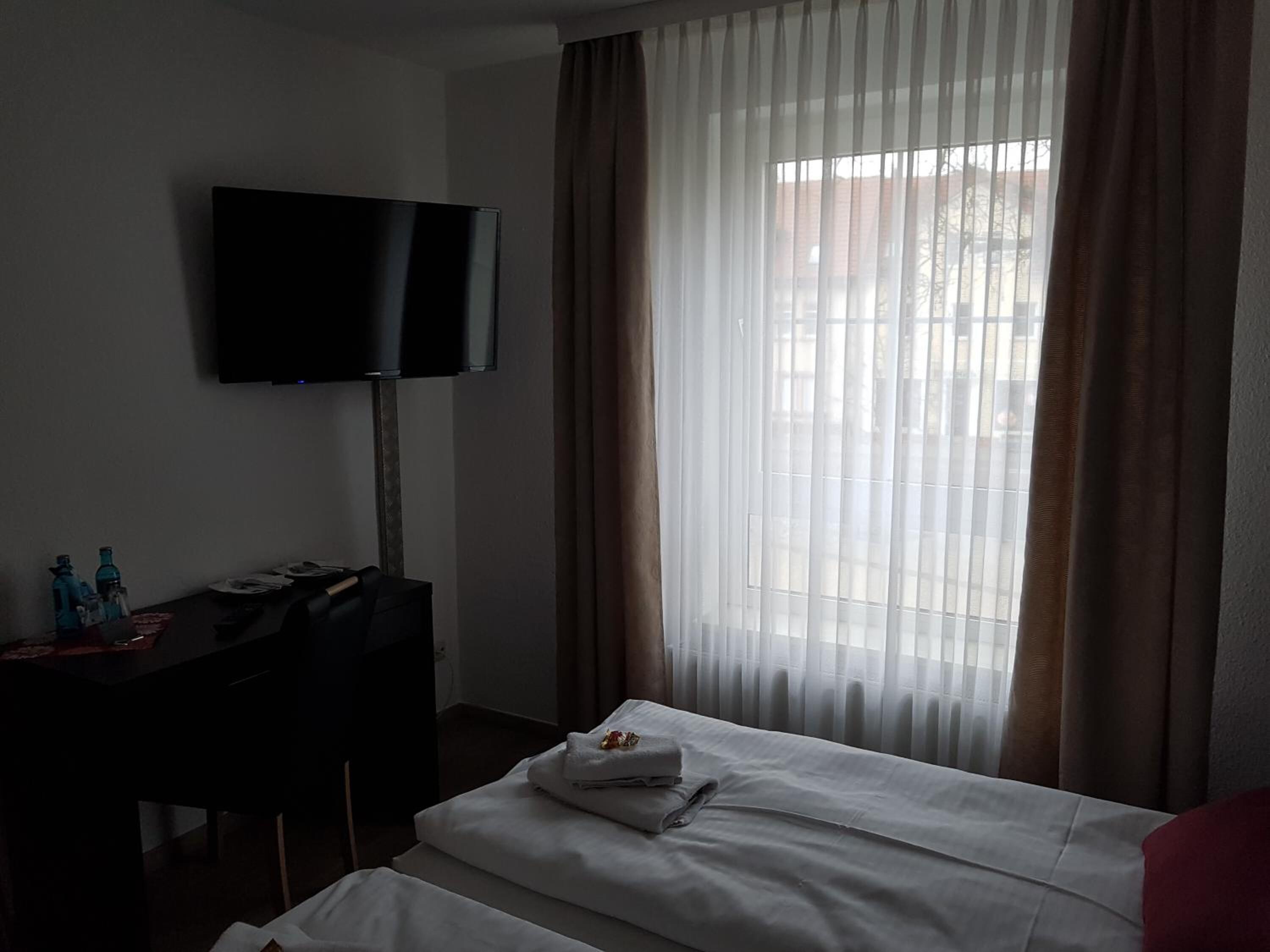 hypo-allergenic bedding, desk, rollaway beds, free wifi