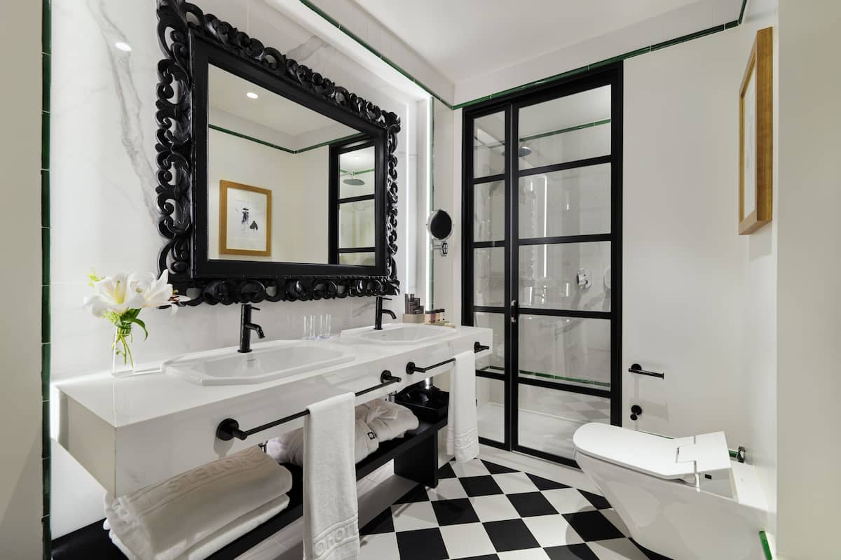 eco-friendly toiletries, hair dryer, bathrobes, slippers