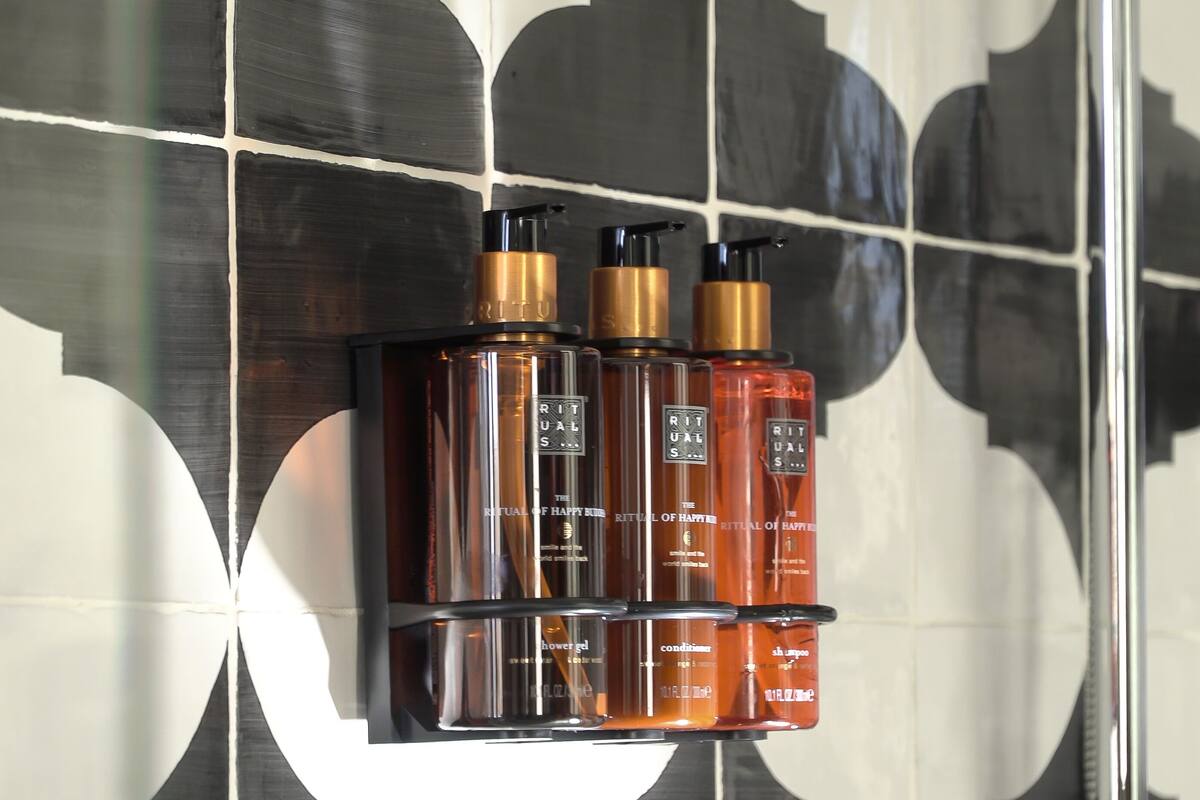 eco-friendly toiletries, hair dryer, bathrobes, slippers