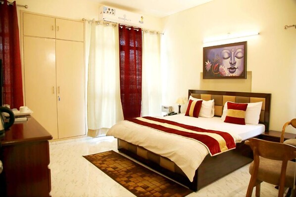 Deluxe Double or Twin Room, 1 Bedroom, Smoking | Pillow-top beds, desk, laptop workspace, soundproofing - Maplewood Stay (New Delhi)