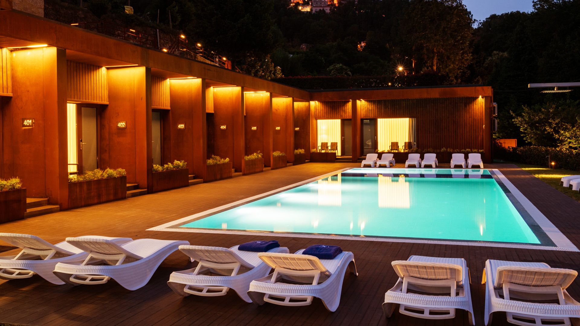 Seasonal outdoor pool, open 10:00 AM to 8:00 PM, pool umbrellas