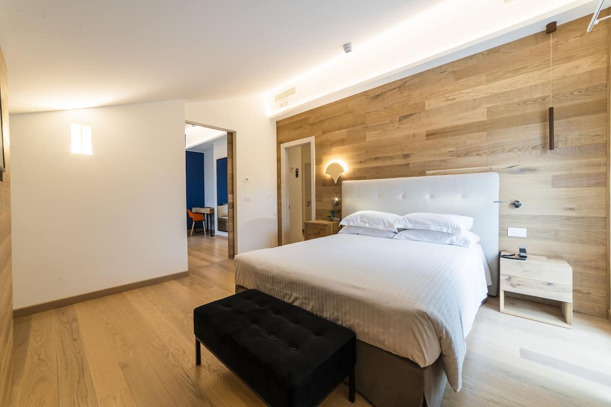 family quadruple room | 1 bedroom, minibar, in-room safe, blackout curtains