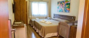 Apartamento luxo (Orquidea) | Frigobar, cofres nos quartos, cortinas blackout, quartos à prova de som