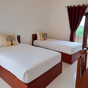 Quarto duplo luxo | 1 quarto, camas com colchões pillow-top, escrivaninha, cortinas blackout