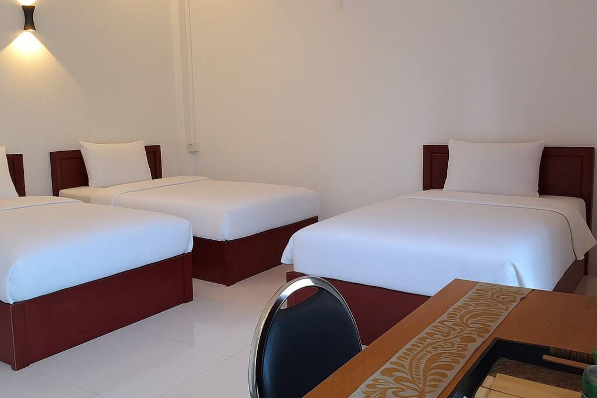 Classic Triple Room, Multiple Bedrooms | 1 bedroom, pillowtop beds, desk, blackout drapes