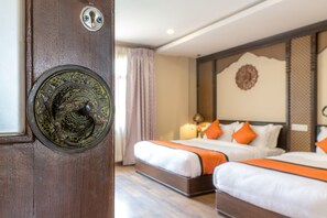 Apartamento superior, 1 quarto, cozinha americana, vista para o jardim | Frigobar, cofres nos quartos, individualmente decorados