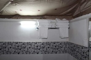 Deluxe Tent, 2 Single Beds, Non Smoking | Bathroom amenities | Shower, rainfall showerhead, towels - Camp Kasbah Bir Resort (Baijnath)