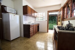 House | Private kitchen | Full-sized fridge, microwave, oven, stovetop
