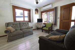 House | Living room | Flat-screen TV - My Home - Treviso (Gramado)