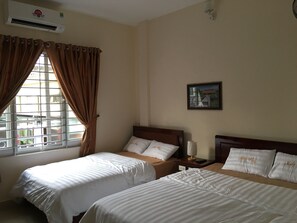 Standard Triple Room | Blackout curtains, soundproofing, free WiFi, bed sheets - MaiLy Hostel (Hue)
