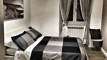 Basic Double Room | Down comforters, desk, blackout drapes, cribs/infant beds