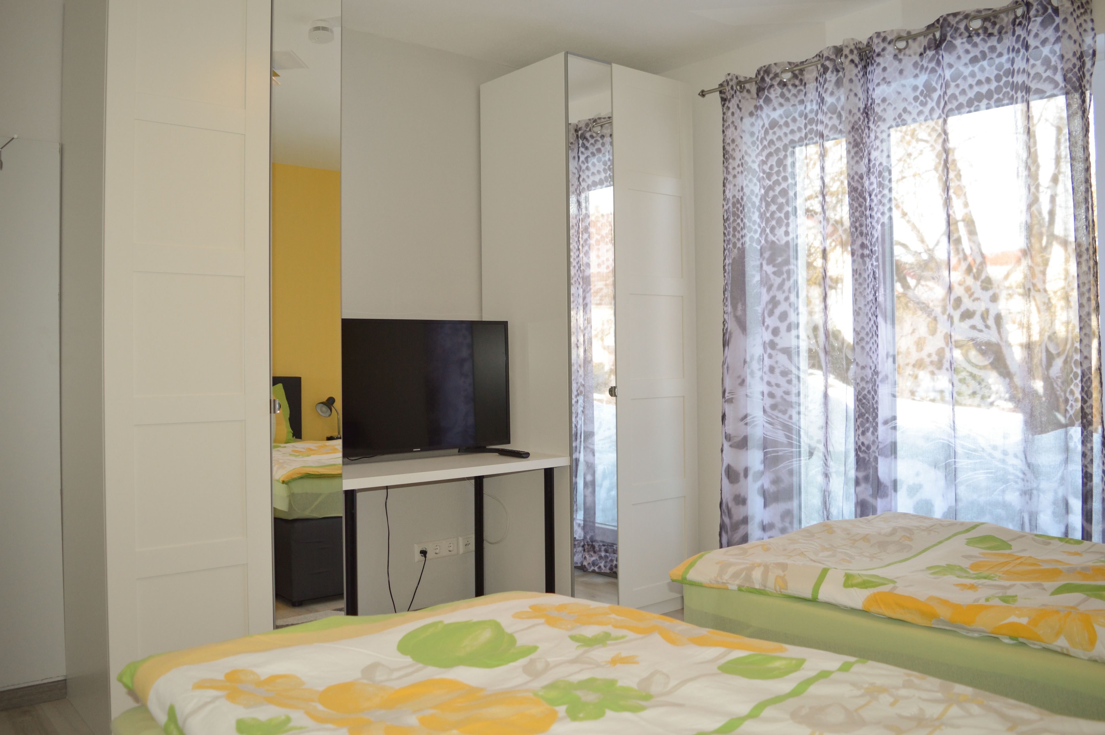 Comfort-Doppel- oder -Zweibettzimmer, 2 Einzelbetten, Gartenblick | Zustellbetten, kostenloses WLAN, Bettwäsche