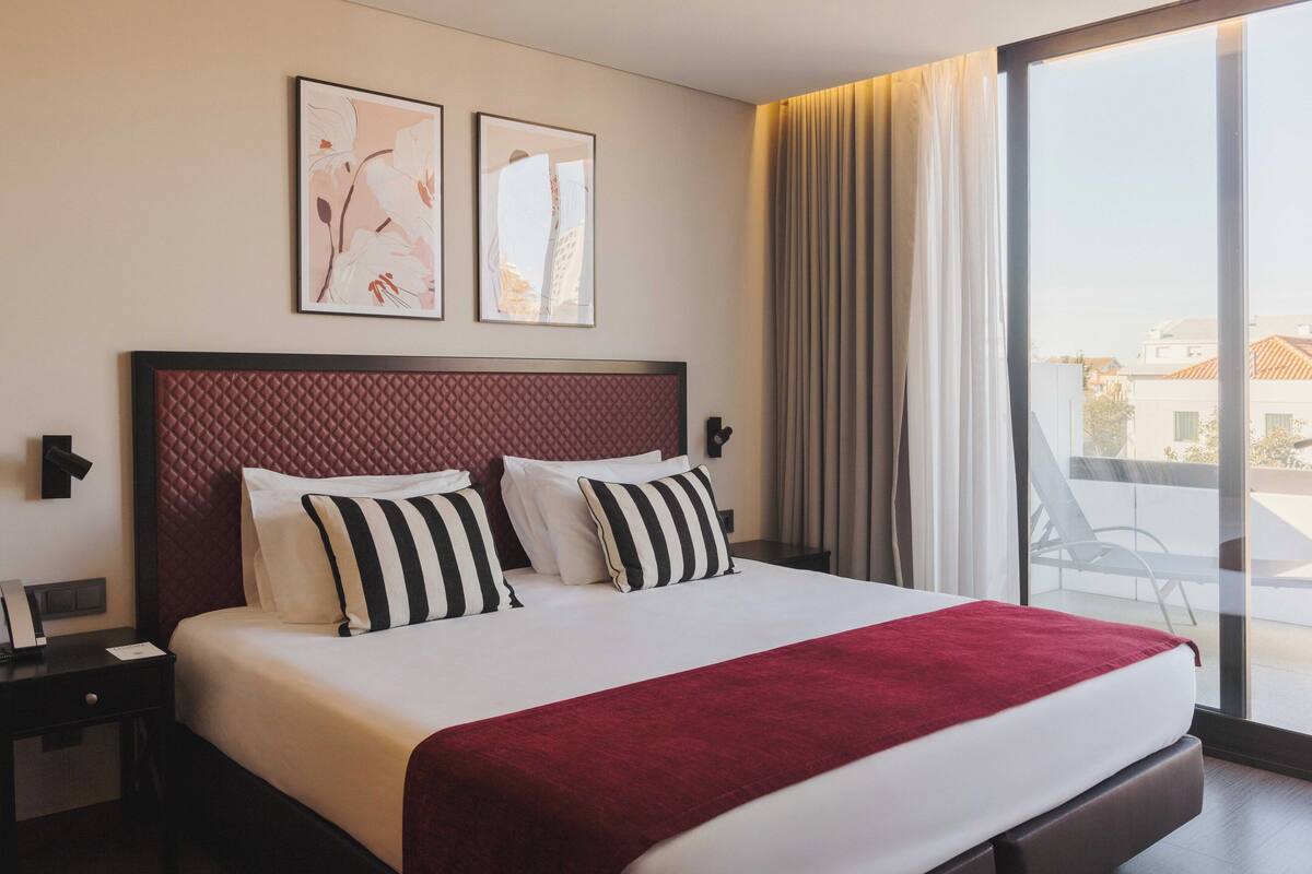 Apartamento, 1 quarto, terraço | 1 quarto, frigobar, cofres nos quartos, individualmente decorados
