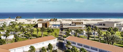 2 outdoor pools, pool umbrellas, sun loungers