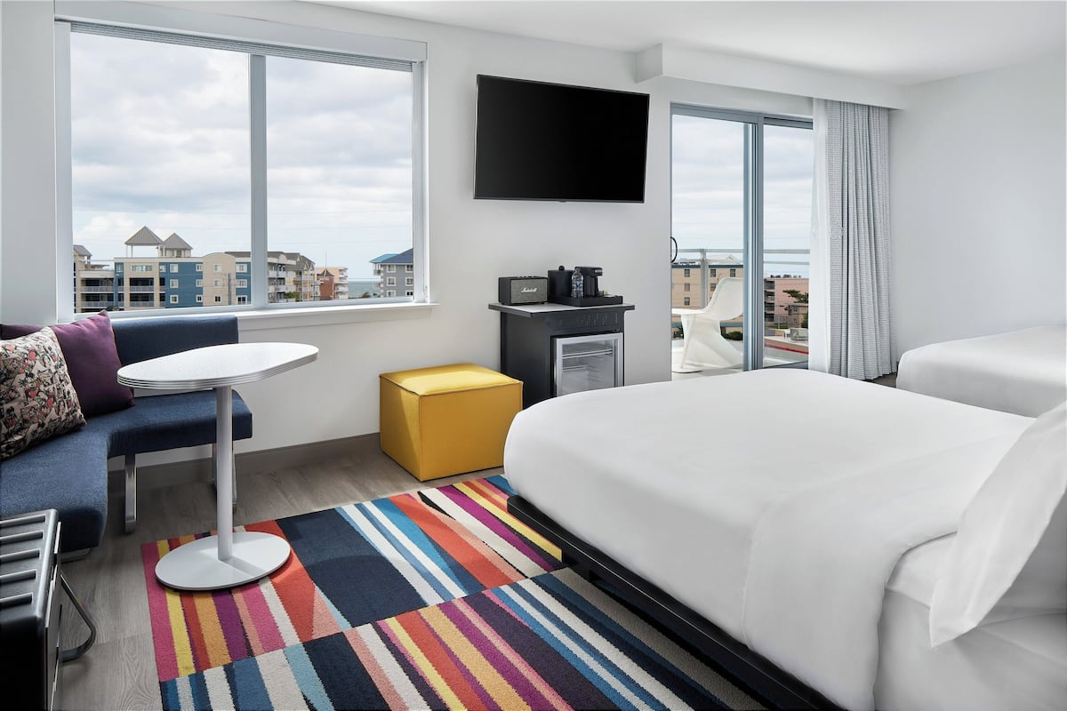 Hypo-allergenic bedding, in-room safe, blackout curtains