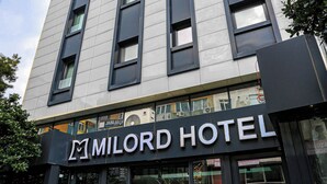 A modern hotel building with a prominent sign reading "MILORD HOTEL". - Milord Hotel (Istanbul)