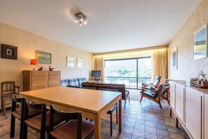 Apartment, 2 Bedrooms (Zandstuyver 102) | Living area | Flat-screen TV