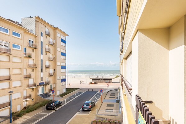 Enjoy stunning views of the beach from the comfort of your balcony.